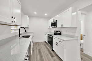 Beautiful kitchen with stainless appliances and quartz countertops