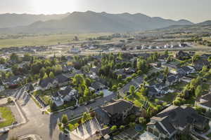 Aerial overview of property's location featuring nearby suburban area