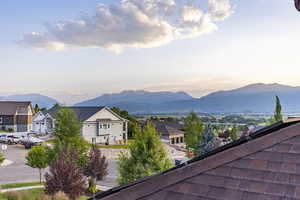 View of mountain backdrop with nearby suburban area