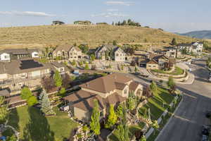 Aerial view of residential area featuring mountains