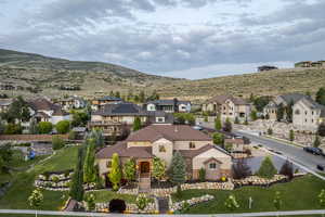 Aerial view of residential area with a mountain backdrop