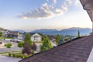 View of mountain background featuring nearby suburban area