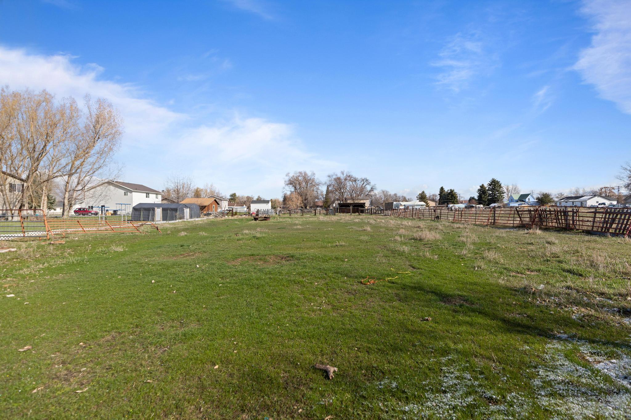View of yard featuring fence