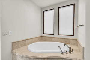 Bathroom featuring a garden tub