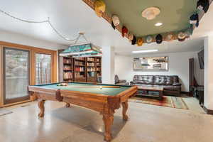 Game room with recessed lighting, finished concrete floors, visible vents, and billiards