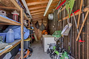 Storage shed connected to garage.