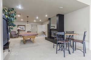 Recreation room with carpet, billiards, and recessed lighting