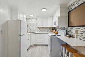 Mother-in-law kitchen and bar top dining area