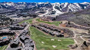 Exterior space featuring view of golf course and a mountain view