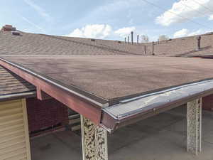 Details featuring roof with shingles