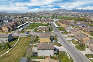 Drone / aerial view featuring a mountain view and a residential view