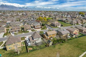 Drone / aerial view with a residential view and a mountain view