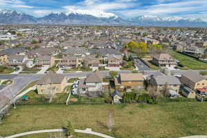 Aerial view featuring a mountain view and a residential view