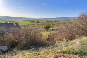 View of mountain feature with a rural view