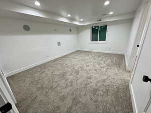 Interior space with baseboards, visible vents, and recessed lighting