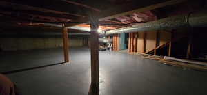 Large storage area under the living room and kitchen area.
