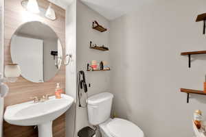 Bathroom with a sink and toilet