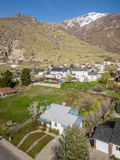 Drone / aerial view with a residential view and a mountain view