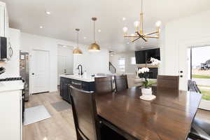 Dining room featuring a chandelier, recessed lighting