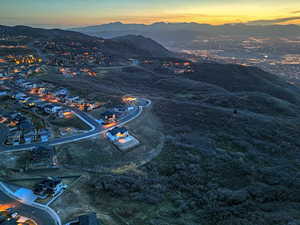 Aerial view at dusk featuring a mountain view