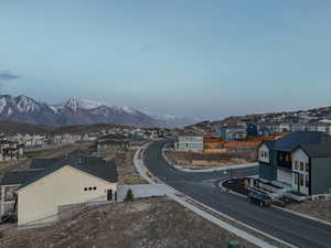 Property view of mountains with a residential view