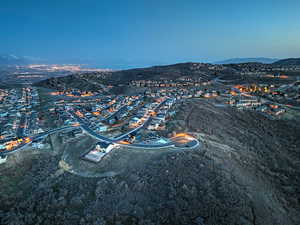 Birds eye view of property with a mountain view