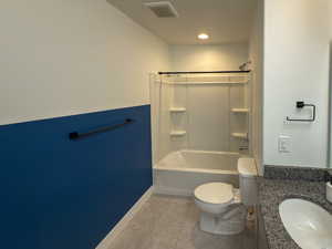 Full bath featuring vanity, tile patterned flooring, visible vents,  shower combination, and toilet
