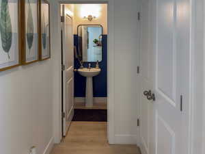 Hall with light wood-style floors