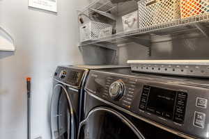 Clothes washing area with separate washer and dryer and laundry area