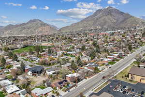 Drone / aerial view with a residential view and a mountain view