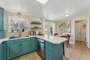 Kitchen with a spacious counter space and stainless appliances