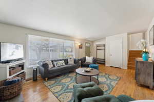 Living room large windows provide so much natural light