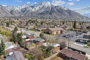 Drone / aerial view with a residential view and a mountain view