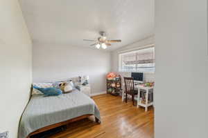 Bedroom 3 with hardwood floors
