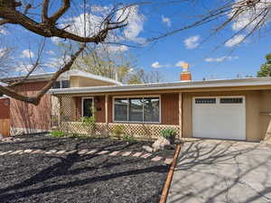 View of front of home with attached garage