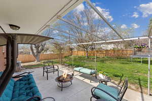 View of patio back patio looking into fenced backyard