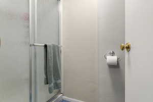 Bathroom featuring a stall shower