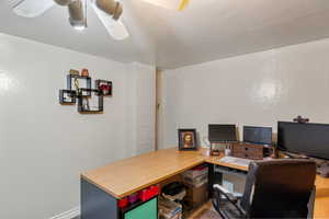 Office area featuring ceiling fan