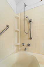 Full bath featuring shower / tub combination