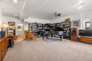 Interior space featuring recessed lighting, a ceiling fan, and carpet floors