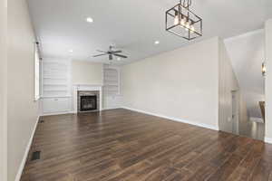Unfurnished living room featuring ceiling fan, dark wood-type flooring, visible vents, recessed lighting, and baseboards