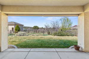 View of yard featuring fence