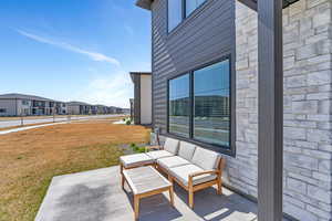View of patio / terrace featuring a residential view and an outdoor hangout area