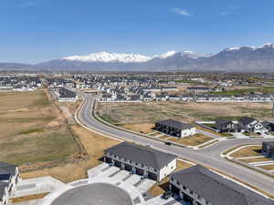 Drone / aerial view with a residential view and a mountain view