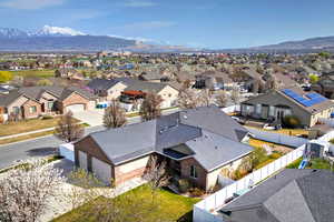 Birds eye view of property with a residential view and a mountain view