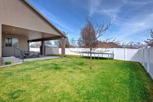 View of yard featuring patio area, and a fenced backyard