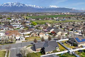 Birds eye view of property featuring a residential view and a mountain view