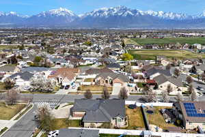 Drone / aerial view featuring a residential view and a mountain view