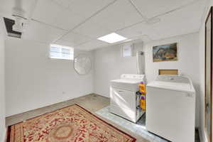Laundry room with washing machine and dryer and laundry area