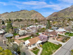 Birds eye view of property featuring a residential view and a mountain view